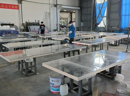 A water walkway composed of dozens of small acrylic panels